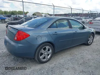 2005 Pontiac G6 GT with VIN 1G2ZH528954151407, listed as a IAAI auction lot 39966969 with 1 mi miles. Bid and sale history available at carsss.com. Image 4.
