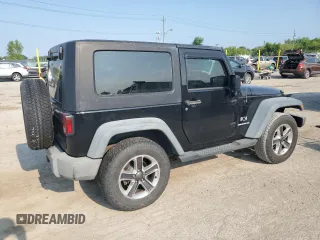 2009 Jeep Wrangler X with VIN 1J4FA24159L772540, listed as a Copart auction lot 62183815 with 179,628 mi miles and Salvage title. Bid and sale history available at DreamBid. Image 3.