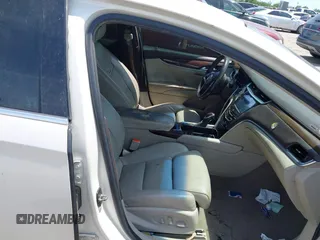 2013 Cadillac XTS Premium z VIN 2G61S5S33D9235025, wystawiony jako IAAI lot #42288742 z przebiegiem 180 221 mil mil oraz . Historia ofert i sprzedaży dostępna na DreamBid. Obrazek 5.