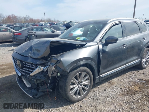 2021 Mazda CX-9 Signature with VIN JM3TCBEY5M0523199, listed as a IAAI auction lot 41916480 with 56,772 mi miles. Bid and sale history available at carsss.com. Image 2.