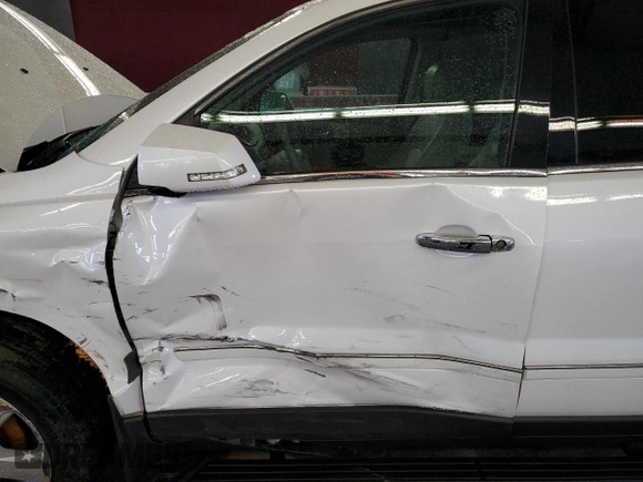 2017 Chevrolet Traverse Premier with VIN 1GNKVJKD9HJ323573, listed as a Copart auction lot 47607905 with 82,051 mi miles and Salvage Title. Bid and sale history available at DreamBid. Image 7.