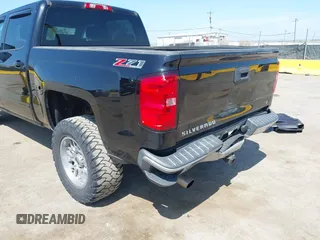 2015 Chevrolet Silverado 1500 LT with VIN 3GCUKRECXFG370962, listed as a IAAI auction lot 42141566 with 92,292 mi miles and . Bid and sale history available at DreamBid. Image 6.
