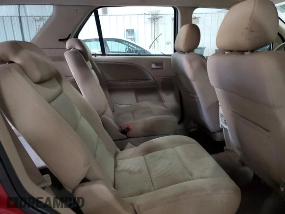 2005 Ford Freestyle SE with VIN 1FMZK04135GA56805, listed as a Copart auction lot 80536224 with 119,252 mi miles and Salvage title. Bid and sale history available at DreamBid. Image 11.