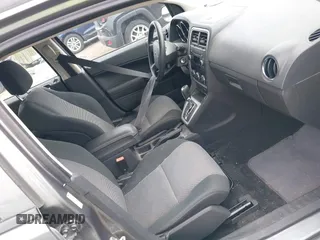 2012 Dodge Caliber SXT z VIN 1C3CDWDA6CD532023, wystawiony jako IAAI lot #42381719 z przebiegiem 210 000 mil mil oraz . Historia ofert i sprzedaży dostępna na DreamBid. Obrazek 5.