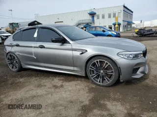 2020 BMW M5 z VIN WBSJF0C09LCE72758, wystawiony jako Copart lot #51132475 z przebiegiem Nie podano mil oraz Szkoda całkowita • Salvage title. Historia ofert i sprzedaży dostępna na DreamBid. Obrazek 4.