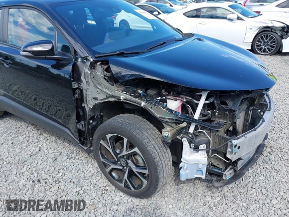 2021 Toyota C-HR LE with VIN NMTKHMBX3MR139981, listed as a IAAI auction lot 42188321 with 22,852 mi miles and . Bid and sale history available at DreamBid. Image 6.