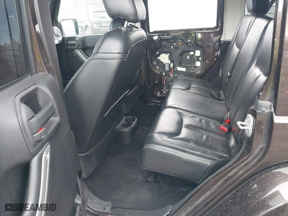 2013 Jeep Wrangler Unlimited Sahara with VIN 1C4BJWEG9DL686090, listed as a IAAI auction lot 41684264 with 126,000 mi miles. Bid and sale history available at carsss.com. Image 8.