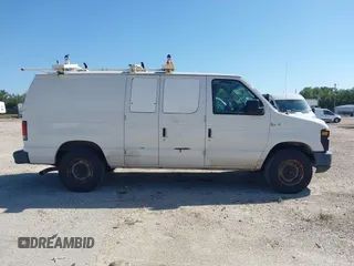 2012 Ford Econoline Cargo Commercial z VIN 1FTNE2EL5CDB10478, wystawiony jako IAAI lot #41861431 z przebiegiem 165 546 mil mil oraz . Historia ofert i sprzedaży dostępna na DreamBid. Obrazek 13.