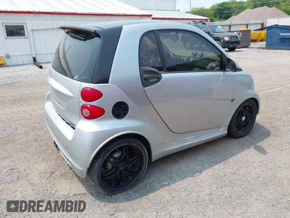2009 Smart fortwo Pure with VIN WMEEJ31X39K276062, listed as a IAAI auction lot 42383073 with 108,190 mi miles and . Bid and sale history available at DreamBid. Image 4.