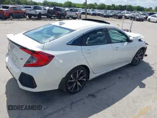 2018 Honda Civic Si with VIN 2HGFC1E53JH700251, listed as a IAAI auction lot 42043732 with 104,763 mi miles and . Bid and sale history available at DreamBid. Image 4.