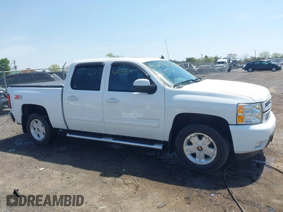 2013 Chevrolet Silverado 1500 LTZ with VIN 3GCPKTE24DG123063, listed as a IAAI auction lot 42061675 with 221,813 mi miles and . Bid and sale history available at DreamBid. Image 13.