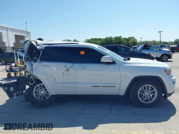 2018 Jeep Grand Cherokee Laredo E z VIN 1C4RJEAG3JC430294, wystawiony jako IAAI lot #42029870 z przebiegiem 109 437 mil mil oraz . Historia ofert i sprzedaży dostępna na DreamBid. Obrazek 13.