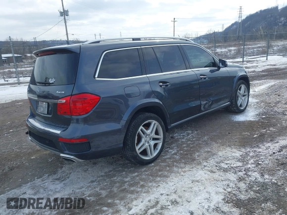 2014 Mercedes-Benz GL-Class GL 550 with VIN 4JGDF7DE3EA321574, listed as a IAAI auction lot 41598200 with 93,190 mi miles. Bid and sale history available at carsss.com. Image 4.