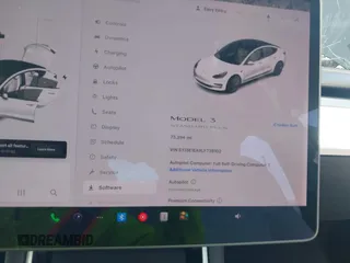 2020 Tesla Model 3 Standard Range Plus z VIN 5YJ3E1EA9LF738102, wystawiony jako IAAI lot #42107744 z przebiegiem 73 294 mil mil oraz . Historia ofert i sprzedaży dostępna na DreamBid. Obrazek 7.