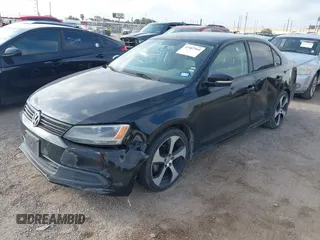 2014 Volkswagen Jetta SE with VIN 3VWD17AJ0EM381770, listed as a IAAI auction lot 42487960 with 135,747 mi miles and . Bid and sale history available at DreamBid. Image 2.