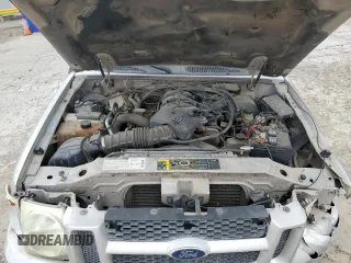 2004 Ford Explorer Sport Trac XLS z VIN 1FMDU67K74UA39405, wystawiony jako Copart lot #54615825 z przebiegiem 194 274 mil mil oraz Szkoda całkowita • Salvage title. Historia ofert i sprzedaży dostępna na DreamBid. Obrazek 11.