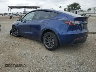 2024 Tesla Model Y Long Range with VIN 7SAYGDEE0RF176672, listed as a Copart auction lot 55622355 with 6,728 mi miles and Salvage title. Bid and sale history available at DreamBid. Image 2.