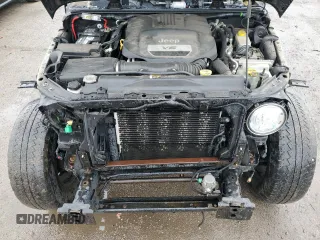 2017 Jeep Wrangler Unlimited Sahara with VIN 1C4BJWEGXHL594203, listed as a Copart auction lot 57359515 with 101,763 mi miles and Salvage title. Bid and sale history available at DreamBid. Image 12.