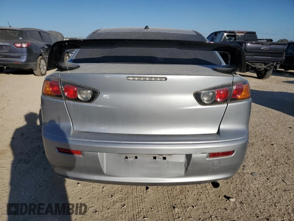 2014 Mitsubishi Lancer ES with VIN JA32U2FU8EU013693, listed as a Copart auction lot 77821024 with 130,306 mi miles and Salvage Title. Bid and sale history available at DreamBid. Image 6.