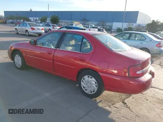 2001 Nissan Altima GXE with VIN 1N4DL01DX1C166896, listed as a IAAI auction lot 41335212 with 163,236 mi miles. Bid and sale history available at carsss.com. Image 3.
