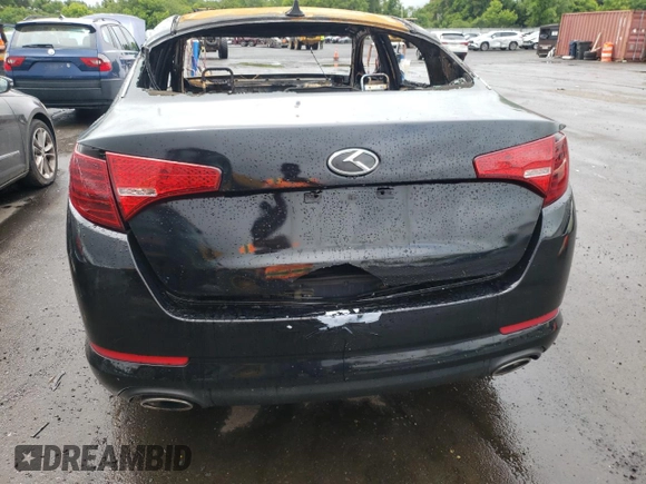 2013 Kia Optima LX z VIN 5XXGM4A72DG221738, wystawiony jako Copart lot #58740985 z przebiegiem Nie podano mil oraz Szkoda całkowita • Salvage title. Historia ofert i sprzedaży dostępna na DreamBid. Obrazek 6.