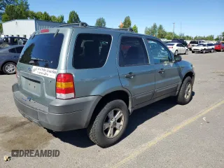 2006 Ford Escape XLT with VIN 1FMYU93166KA29530, listed as a Copart auction lot 59374094 with 209,810 mi miles and Salvage Title. Bid and sale history available at carsss.com. Image 3.