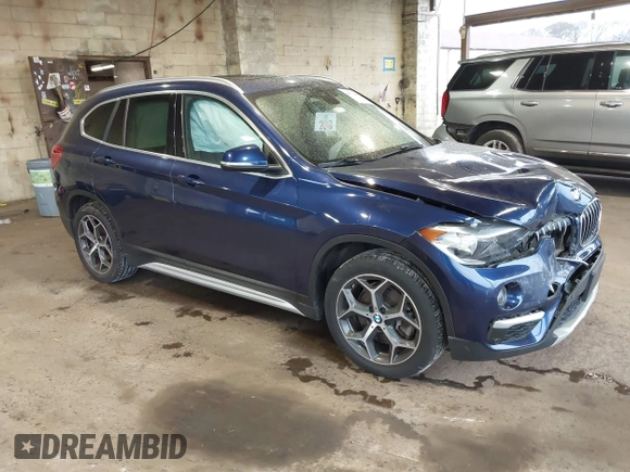 2019 BMW X1 xDrive28i with VIN WBXHT3C55K5L37338, listed as a IAAI auction lot 41934461 with 87,913 mi miles. Bid and sale history available at carsss.com. Image 1.