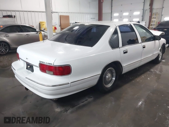 1996 Chevrolet Caprice 1SA Special Value z VIN 1G1BL52P3TR165928, wystawiony jako IAAI lot #41271004 z przebiegiem 130 794 mil mil oraz . Historia ofert i sprzedaży dostępna na DreamBid. Obrazek 4.