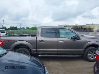 2020 Ford F-150 XL with VIN 1FTEW1EP1LFC03447, listed as a IAAI auction lot 42626026 with 111,525 mi miles and . Bid and sale history available at DreamBid. Image 13.