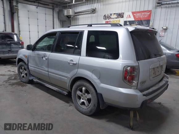 2007 Honda Pilot EX-L with VIN 2HKYF18607H511219, listed as a IAAI auction lot 41368619 with 270,722 mi miles and . Bid and sale history available at DreamBid. Image 3.