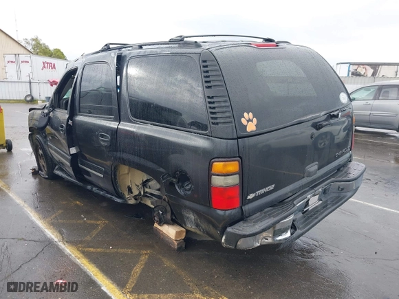 2005 Chevrolet Tahoe Z71 with VIN 1GNEC13T15R205653, listed as a IAAI auction lot 41808672 with 210,261 mi miles. Bid and sale history available at carsss.com. Image 3.