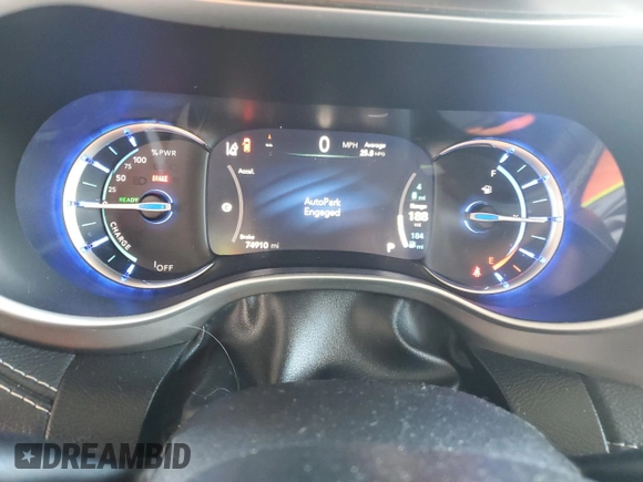 2021 Chrysler Pacifica Hybrid Touring L with VIN 2C4RC1L7XMR593911, listed as a Copart auction lot 57842415 with 74,910 mi miles and Salvage title. Bid and sale history available at DreamBid. Image 9.