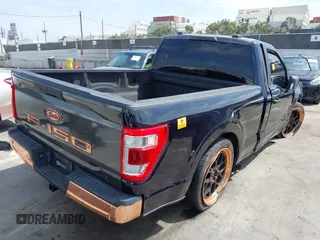 2021 Ford F-150 XL with VIN 1FTMF1E55MKD82627, listed as a IAAI auction lot 41999295 with Not provided miles and . Bid and sale history available at DreamBid. Image 4.
