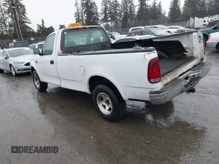 1999 Ford F-150 with VIN 2FTZF1821XCA29298, listed as a IAAI auction lot 41652750 with Not provided miles and . Bid and sale history available at DreamBid. Image 3.