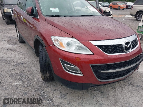 2012 Mazda CX-9 Grand Touring with VIN JM3TB2DA8C0350347, listed as a IAAI auction lot 42214763 with 281,114 mi miles and . Bid and sale history available at DreamBid. Image 6.