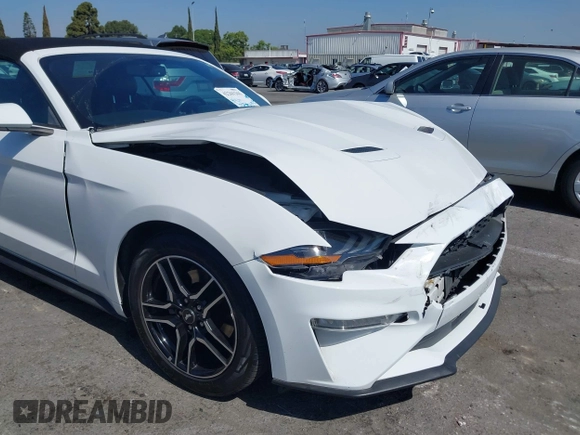 2018 Ford Mustang EcoBoost Premium z VIN 1FATP8UH8J5111364, wystawiony jako IAAI lot #42261261 z przebiegiem 102 703 mil mil oraz . Historia ofert i sprzedaży dostępna na DreamBid. Obrazek 18.