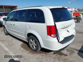 2013 Dodge Grand Caravan SXT with VIN 2C4RDGCG2DR522136, listed as a IAAI auction lot 42023561 with 176,635 mi miles and . Bid and sale history available at DreamBid. Image 3.