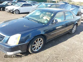 2006 Cadillac DTS 1SE with VIN 1G6KD57966U151010, listed as a IAAI auction lot 42142113 with Not Provided miles and . Bid and sale history available at DreamBid. Image 2.