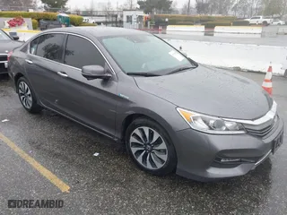 2017 Honda Accord Hybrid with VIN JHMCR6F32HC019665, listed as a IAAI auction lot 41735293 with 106,954 mi miles. Bid and sale history available at carsss.com. Image 1.