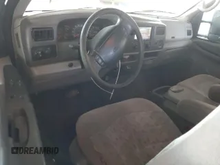 1999 Ford F-250 XL with VIN 1FTNX20FXXEE59499, listed as a Copart auction lot 87511735 with 215,520 mi miles and Salvage title. Bid and sale history available at DreamBid. Image 8.