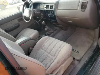 1999 Toyota Tacoma with VIN 4TAPM62N6XZ417283, listed as a Copart auction lot 84322844 with 74,233 mi miles and Clean Title. Bid and sale history available at DreamBid. Image 8.