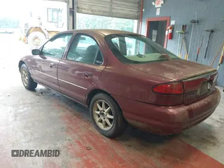 1999 Ford Contour SE z VIN 1FAFP6639XK144984, wystawiony jako IAAI lot #42363538 z przebiegiem 160 891 mil mil oraz . Historia ofert i sprzedaży dostępna na DreamBid. Obrazek 3.