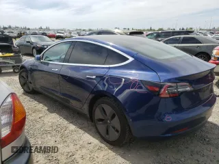 2018 Tesla Model 3 Long Range Battery with VIN 5YJ3E1EB3JF093680, listed as a Copart auction lot 52757865 with 60,598 mi miles and Salvage Title. Bid and sale history available at DreamBid. Image 2.