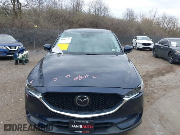 2021 Mazda CX-5 Grand Touring with VIN JM3KFADM0M1321375, listed as a IAAI auction lot 41913449 with 88,178 mi miles. Bid and sale history available at carsss.com. Image 13.
