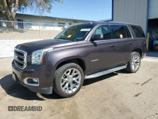 2015 GMC Yukon SLT z VIN 1GKS1BKC5FR689549, wystawiony jako Copart lot #56747385 z przebiegiem 102 856 mil mil oraz Szkoda całkowita • Salvage title. Historia ofert i sprzedaży dostępna na DreamBid. Obrazek 1.