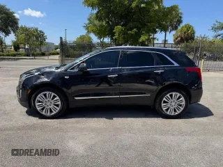 2018 Cadillac XT5 Premium Luxury FWD z VIN 1GYKNERS6JZ139813, wystawiony jako Copart lot #57681285 z przebiegiem 96 567 mil mil oraz Nie do naprawy. Historia ofert i sprzedaży dostępna na DreamBid. Obrazek 12.