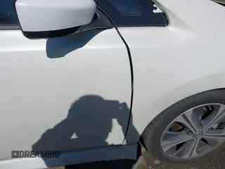 2021 Nissan LEAF SV with VIN 1N4AZ1CV8MC556168, listed as a IAAI auction lot 41758095 with 16,631 mi miles and . Bid and sale history available at DreamBid. Image 21.