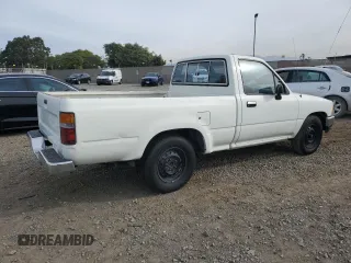 1993 Toyota Pickup DX with VIN JT4RN81P4P5168613, listed as a Copart auction lot 82611524 with 200,408 mi miles and Clean title. Bid and sale history available at DreamBid. Image 3.