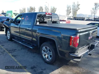 2018 GMC Sierra 1500 with VIN 3GTU1NEC7JG257796, listed as a IAAI auction lot 41570419 with 92,186 mi miles and . Bid and sale history available at DreamBid. Image 3.