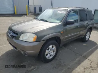 2002 Mazda Tribute LX with VIN 4F2YU081X2KM29724, listed as a Copart auction lot 47896495 with 100,028 mi miles and Clean Title. Bid and sale history available at carsss.com. Image 1.